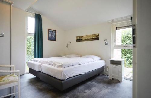 Heinkenszand House | Holiday Home in Zeeland near Lake & Sauna
