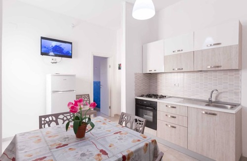 Porto Cesareo House | Holiday Home 'Luna Rossa' with Private Terrace, Wi-Fi and Air Conditioning