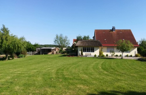 Kalkhorst House | Holiday Home "Naturteich Haus" with Private Swimming Pond, Private Terraces and Wi-Fi