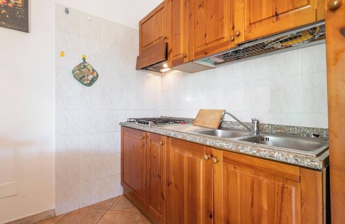 Villasimius House | Holiday Home "Nicoletta" with Garden, Air Conditioning & Barbecue