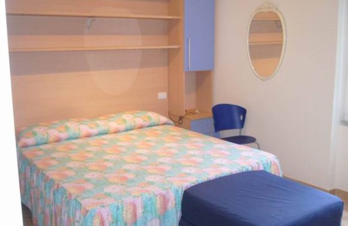 Giannella House | Holiday Home 'Residence Giannella - Robinia 35' with Private Garden and Air Conditioning