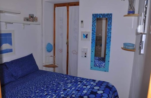 Giannella House | Holiday Home 'Residence Giannella - Magnolia 45' with Private Garden and Air Conditioning