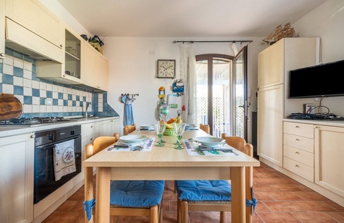 Calasetta House | Holiday Home 'Villetta Gelsomino' with Sea View, Garden & Terrace