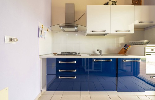 Castiadas House | Holiday Home 'Villetta Olia Speccciosa' with Private Garden, Balcony and Air Conditioning