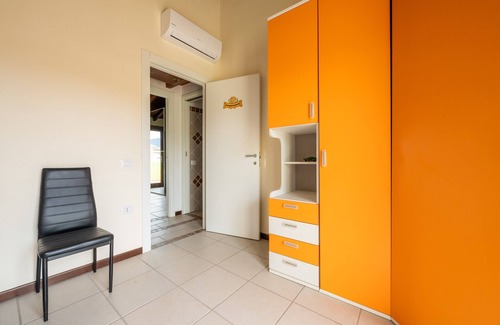 Castiadas House | Holiday Home 'Villetta Olia Speccciosa' with Private Garden, Balcony and Air Conditioning