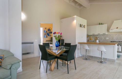Cecina House | Holiday Home 'Villetta Matilde' with Private Terrace, Private Garden and Air Conditioning