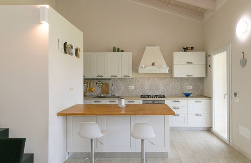 Cecina House | Holiday Home 'Villetta Matilde' with Private Terrace, Private Garden and Air Conditioning
