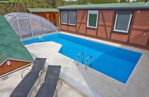 Angern House | Holiday house with pool and sauna in the middle of the forest on the Elbe bike path
