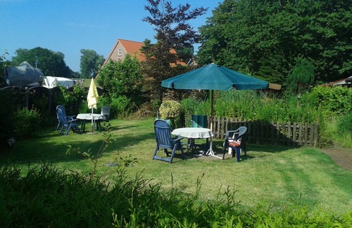 Westeraccumersiel Cabin | Holiday in a simple, rustic log cabin, beach about 1000 meters, sun terrace