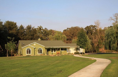 La Grange House | Home in park like setting with 3 acre lake .