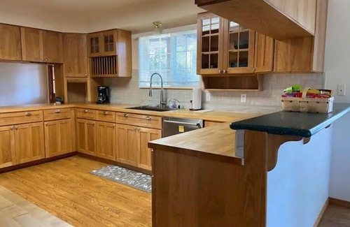 Kenai House | Home in the heart of Kenai on 2 wooded acres across from city park!