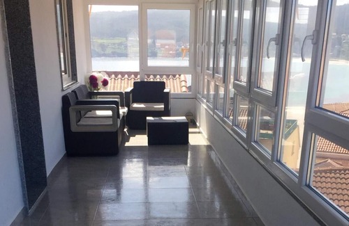 Laxe Apartment | Homerez - 80 m away from the beach! Appartement for 4 ppl. with sea view at Laxe