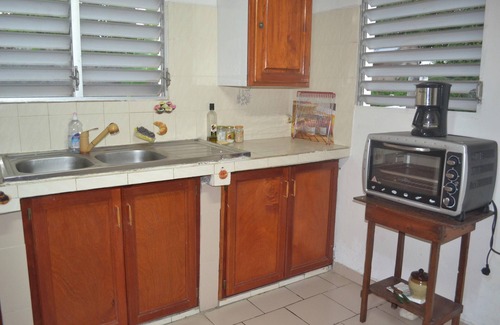 Le Bourg House | Homerez - Charming house in Morne-À-l'Eau, terrace