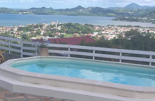Le Robert Apartment | Homerez - Cosy flat in Le Robert with shared pool