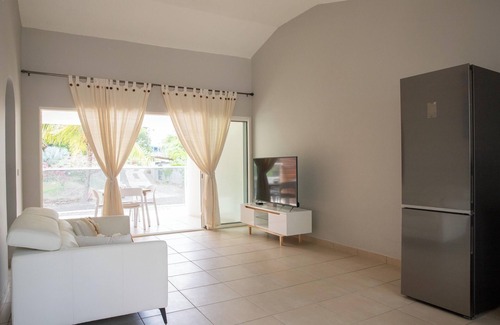 Sainte-Anne House | Homerez - Cozy house with spa and sauna in Sainte-Anne