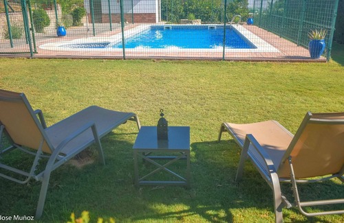 Penaflor Villa | Homerez - Villa for 9 pers. with swimming pool, garden and terrace in La Vereda