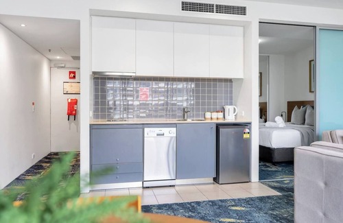 Cairns Central Business District Apartment | Horizons at Harbour Lights Tropical Poolside Flair