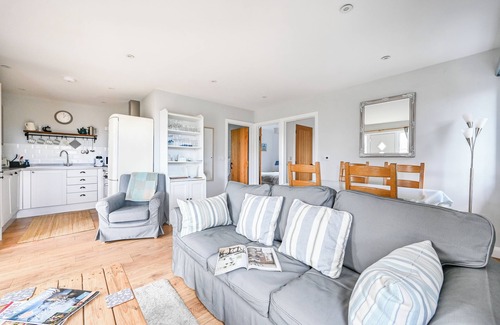 Mabe Cottage | Hot tub and covered seating area with log burner and BBQ