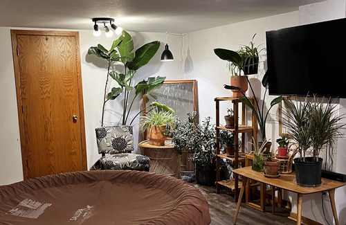 Webster City House | Hot Tub, Fire Pit on patio, Huge Cedar deck with outdoor TV, Fenced in back yard