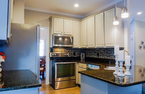 North Raleigh House | Hot Tub, Game Room, Theater Room & Fenced In Yard!