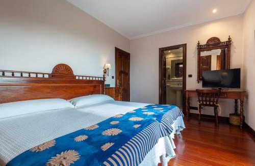 Sardinero House | Hotel - Casa de Turismo Rural Dugium