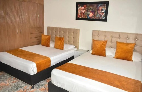 Suba Bed & Breakfast | Hotel Flamante Bulevar - Room 2 double beds with private bathroom
