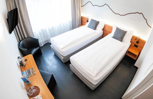 Central Interlaken Hotel | Hotel Merkur - West Station