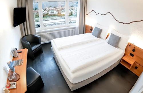 Central Interlaken Hotel | Hotel Merkur - West Station