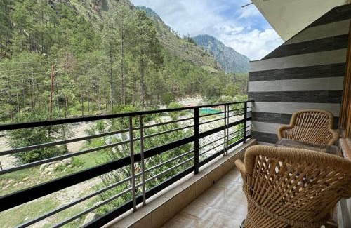 Kasol Hotel | Hotel Mid Orchard Kasol l River Side -Pure Veg Hotel