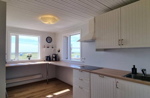 Borgarnes House | House by the ocean. Hot tub and a mountain view.