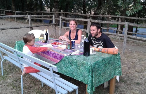 Pailloles House | House in a rural setting with horses nearby