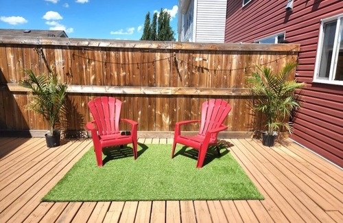 Southeast Edmonton House | House in Summerside with a huge patio and an extra tall garage