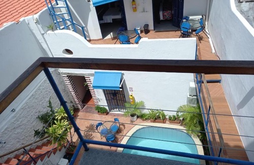 Cartagena Walled City Apartment | HPT-SC1 HABITACION DE HOTEL CUADRUPLE CON PISCINA AIRE ACONDICIONADO Y WIFi EN GETSEMANI