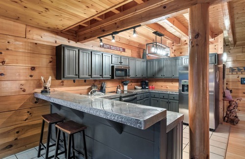 Sevierville Cabin | HUGE 86" THEATER with Stadium Seating, Resort Pool, Hot Tub, Pool Table, Views