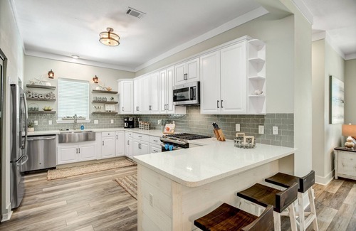 Sugarwood Beach House | Huge heated pool Close to beach and Seaside, 6 seat Gem car