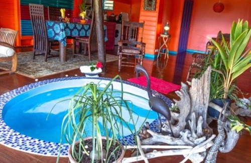 Deshaies House | Hummingbird bungalow with heated punch bowl and massage jet