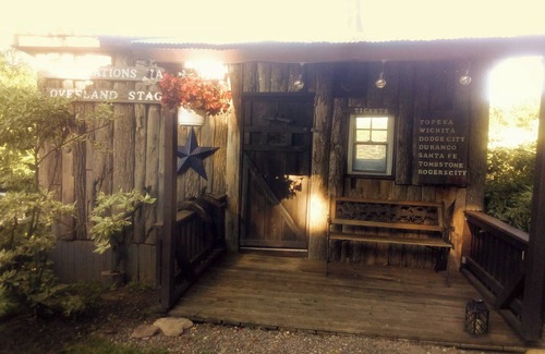 Frontier Cabin | Hunting Cabin Rustic Handcrafted primitive sits in our unique rustic Cowboy Town