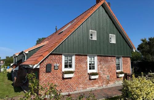 Ostermarsch House | "Huus ant Diek", Ferienhaus mit Maisonette Wohnung in Deichnähe, Nähe Norddeich
