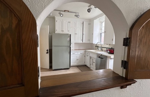 Victory House | Hygge House: fireplace and garage