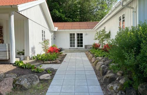 Viborg House | Idyllically Situated Wooden House By The Forest