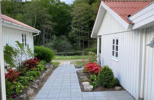 Viborg House | Idyllically Situated Wooden House By The Forest