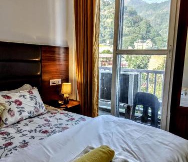 Tapovan Apartment | Ima Ganga Hotel - Aesthetic, Quite Mountain View Rooms with netflix, free airport pickup for 7 or more nights booking