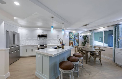 Coquina Sands Condo | Impeccable Condo Across from the Moorings Private Beach plus Private Boat Dock