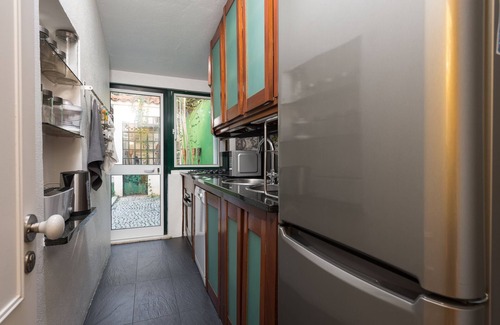 Sacramento Apartment | In Chiado quarter, the luxury of a patio and a garden in a refined cozy flat