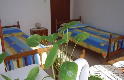 Plomin Apartment | In the bay of Plomin, surrounded by greenery and near the industrial area, are these apartments.