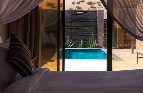 Bidiya Resort | Indulge in desert opulence with our Luxury Pool Tents at Thousand Nights Camp