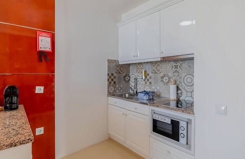 Oura Hotel | Indulge in Home-Like Comfort! Three Relaxing Suites, Pool, Beachfront Property!