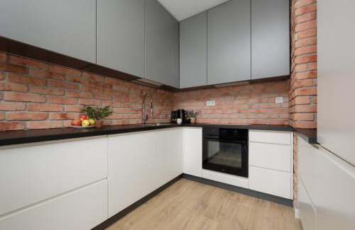Wola Apartment | Industrial Apartment with Parking Fort Wola by Noclegi Renters
