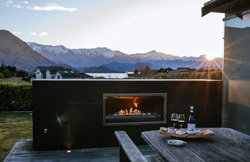 Wanaka House | Infinity Drive · Modern, luxury home with a hot tub and lake views.