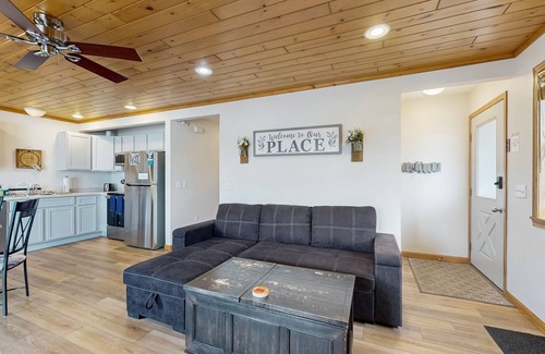 Lake Delton House | Inviting lakefront condo - amazing views, beach access, fireplace, dock, AC, W/D